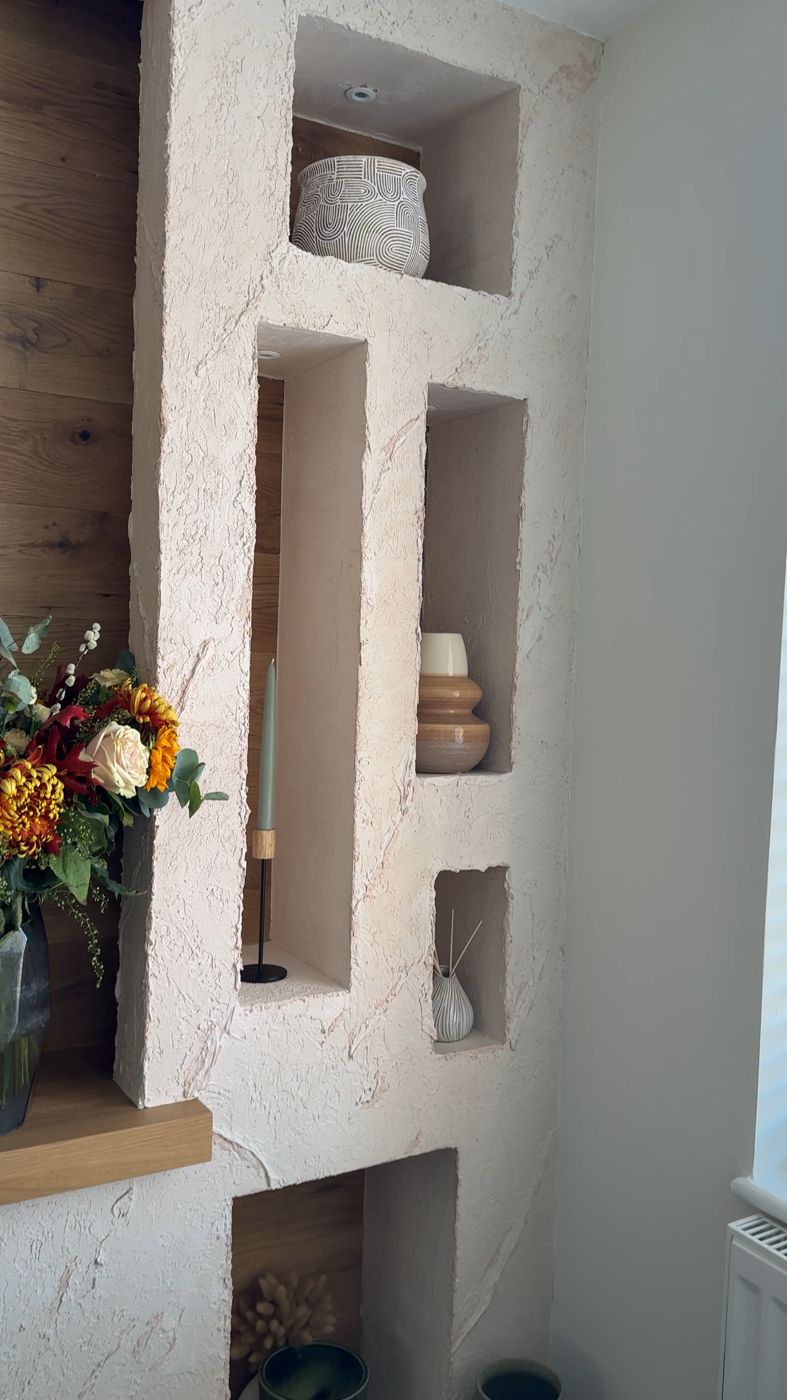 Textured plaster display niches with LED lighting